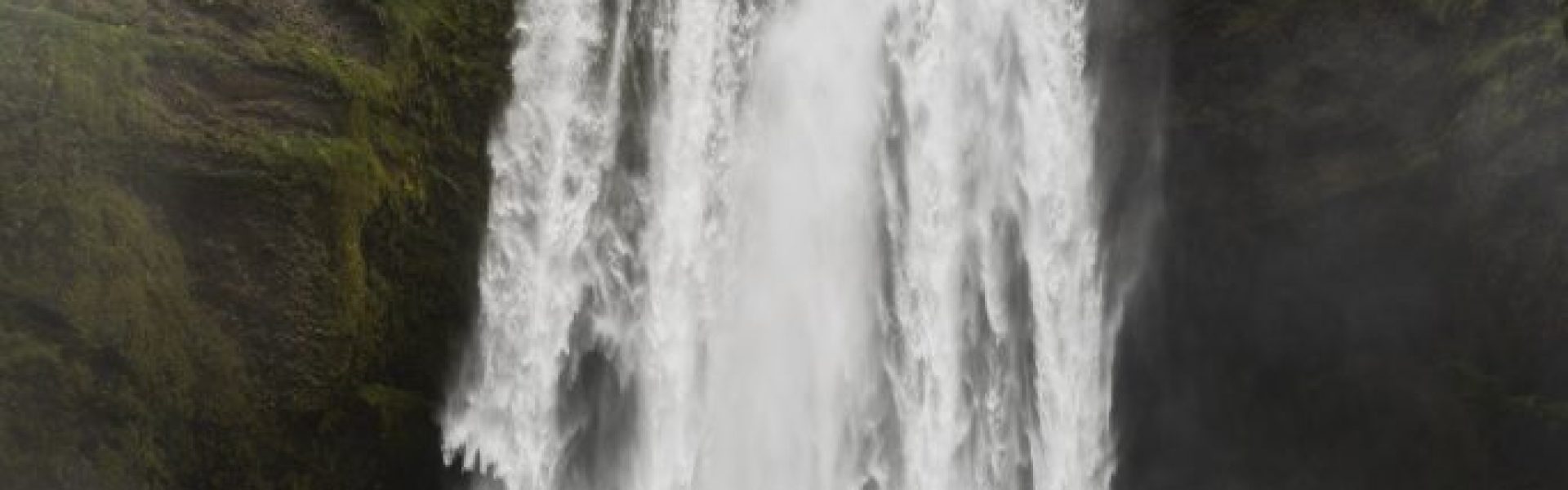 cloudy-nature-landscape-near-waterfall-min