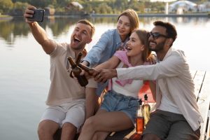 side-view-friends-with-delicious-kombucha-outdoors-min